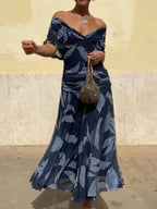 Belinda | Vestido elegante azul oscuro con estampado de hojas